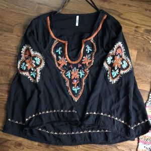 Bell sleeve v-neck blouse with beautiful details